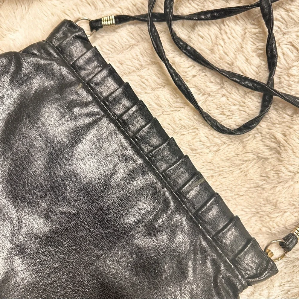 Vintage Chic Black Leather Clutch with strap, Metal inside makes diamond opening